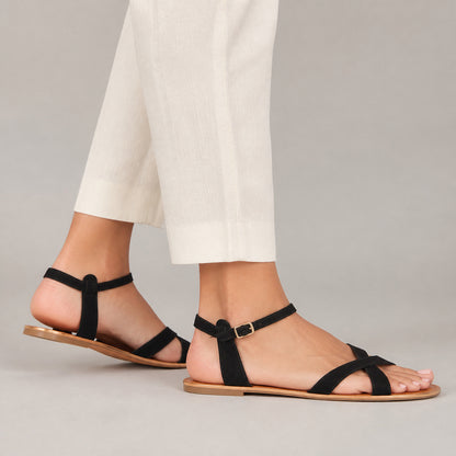 Cleo Cross-Strap Sandals in black, side profile