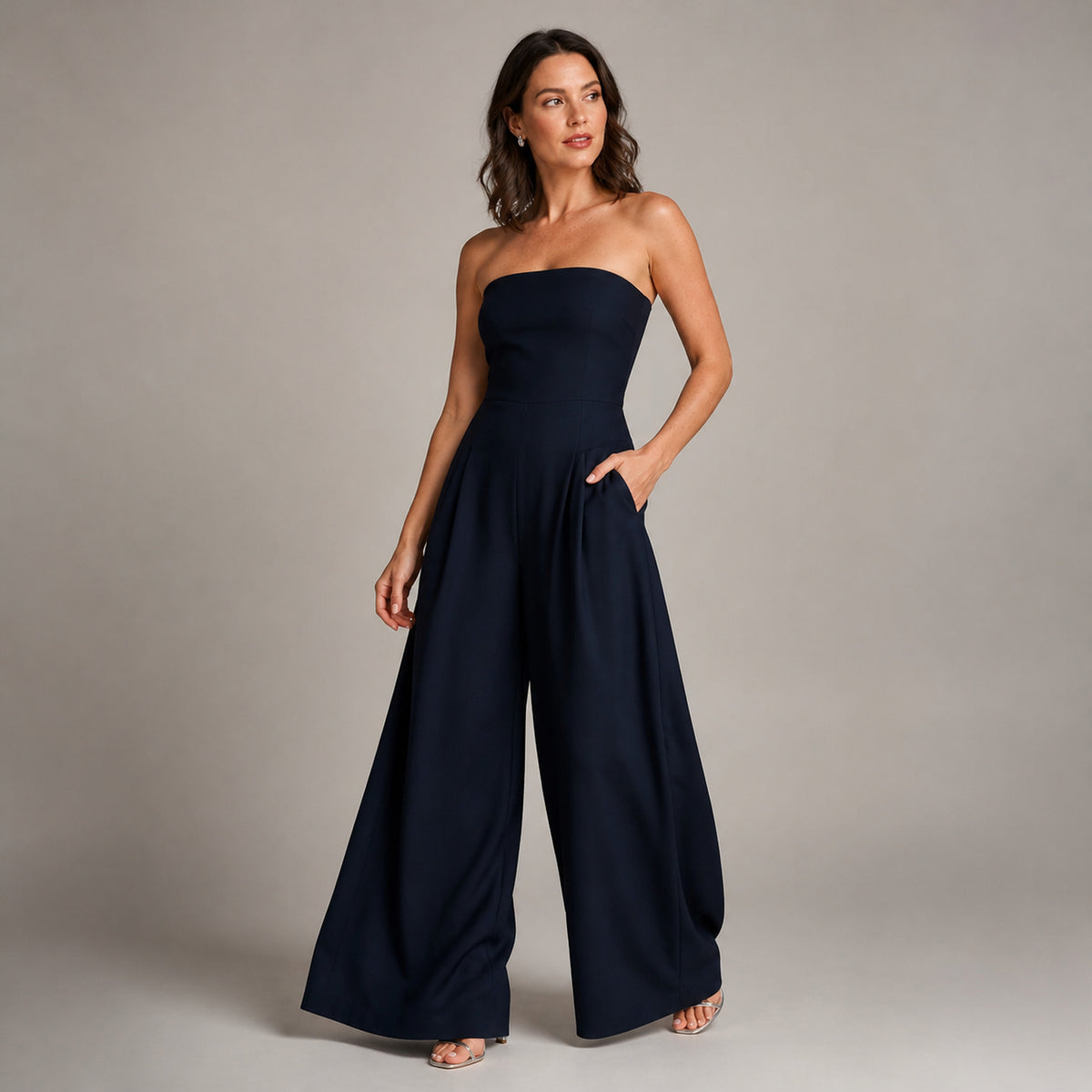 Sloane Strapless Jumpsuit in dark blue, three-quarter view