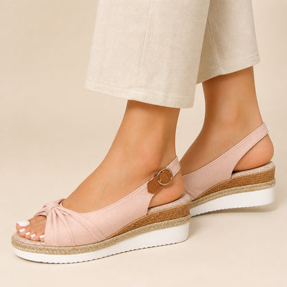 Farrow Wedge Sandals in pink, side profile showing the wedge heel