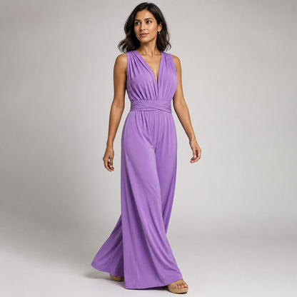 Iris V-Neck Jumpsuit in purple, three-quarter view showing the palazzo leg