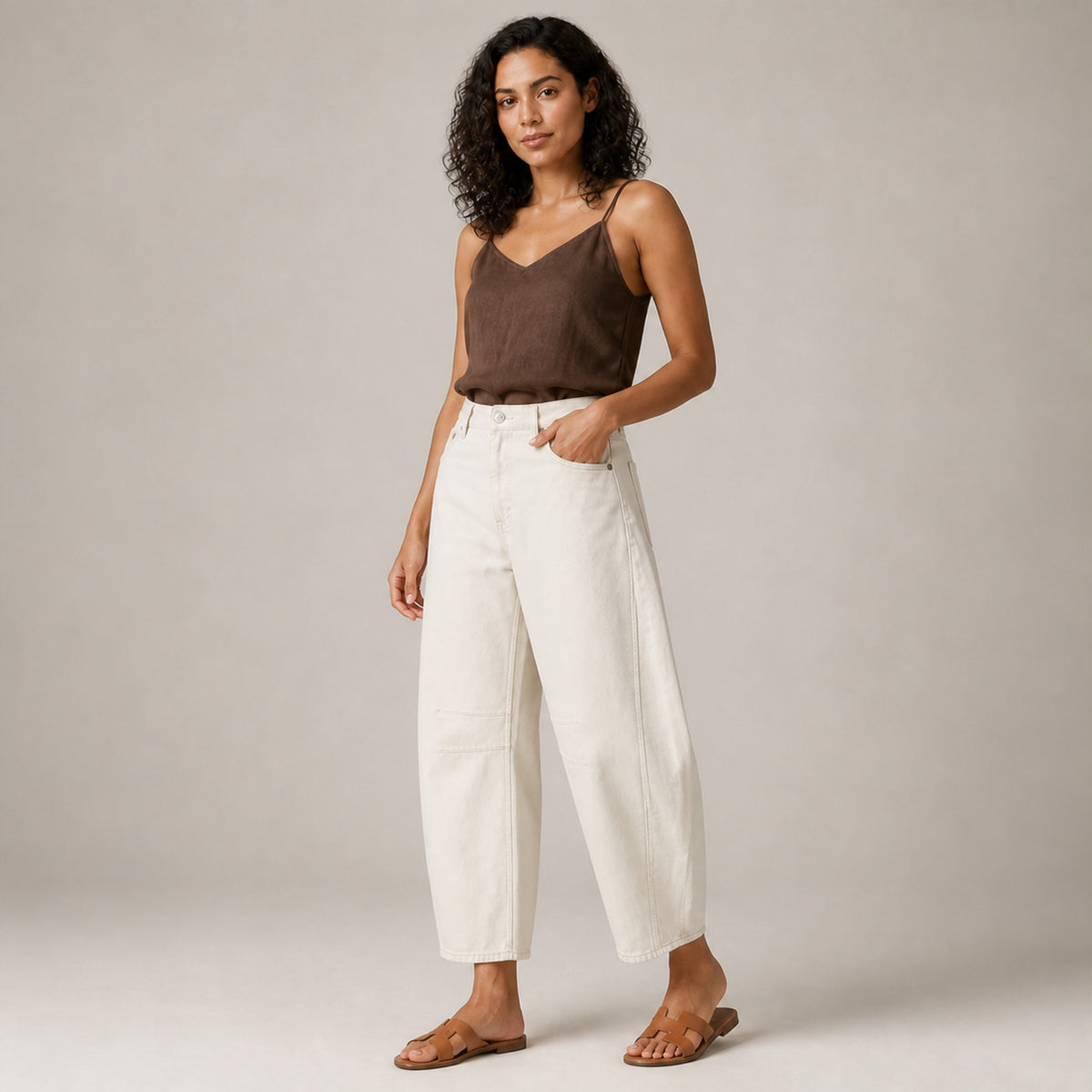 Agnes Barrel Jeans in white, three-quarter view showing the curved leg