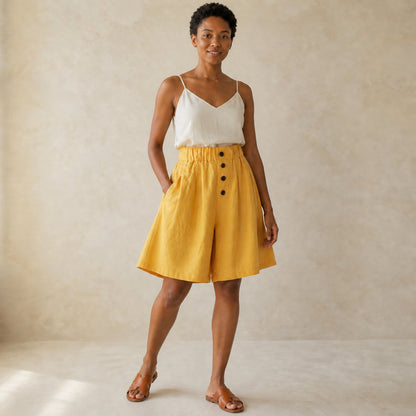 Wren Wide-Leg Shorts in yellow, three-quarter view