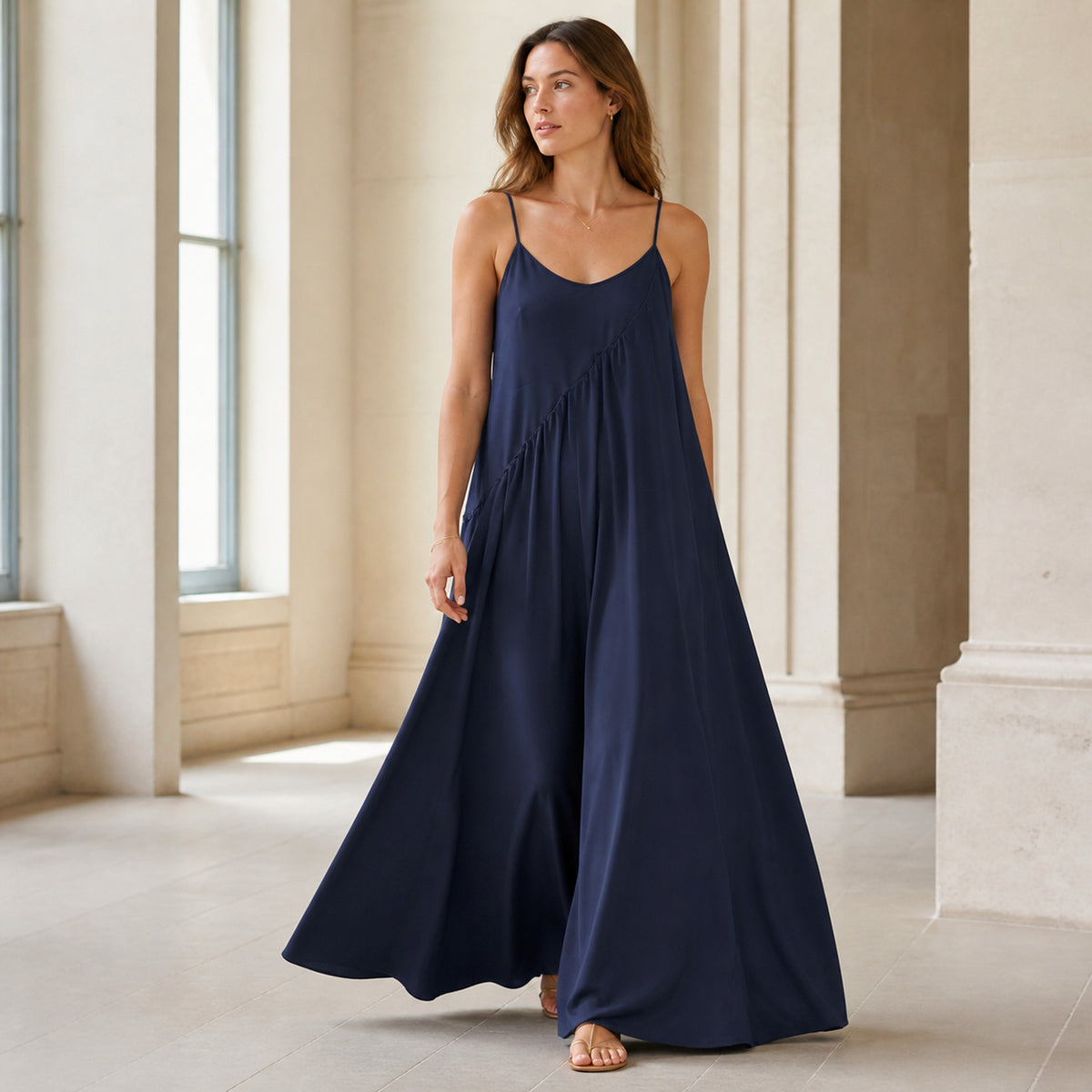Juno Trapeze Maxi in blue, worn in movement showing the trapeze flare