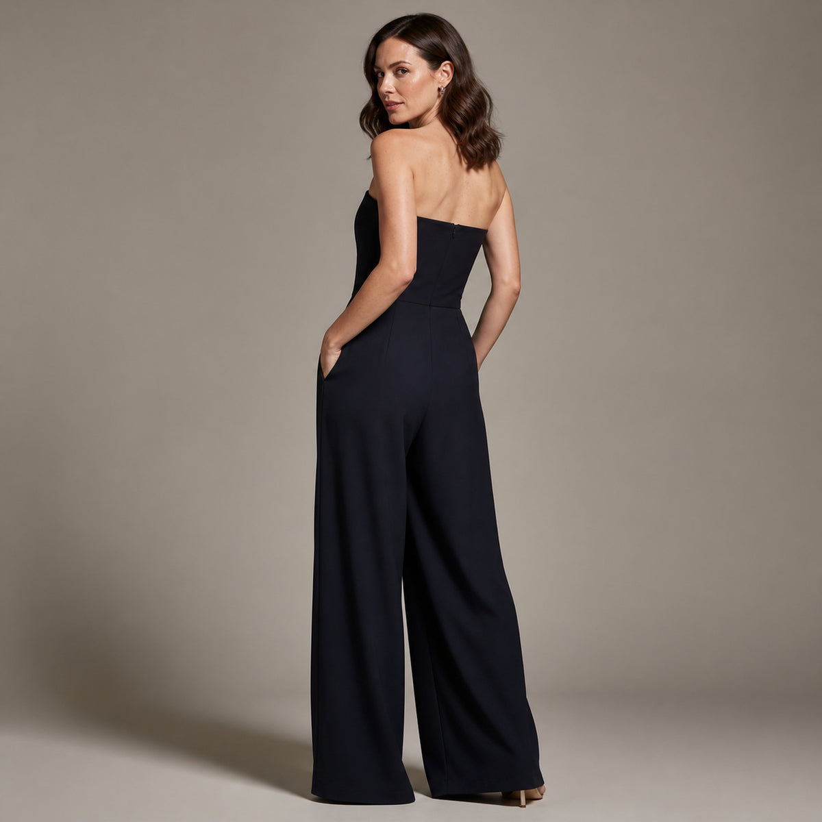 Sloane Strapless Jumpsuit in dark blue, back view
