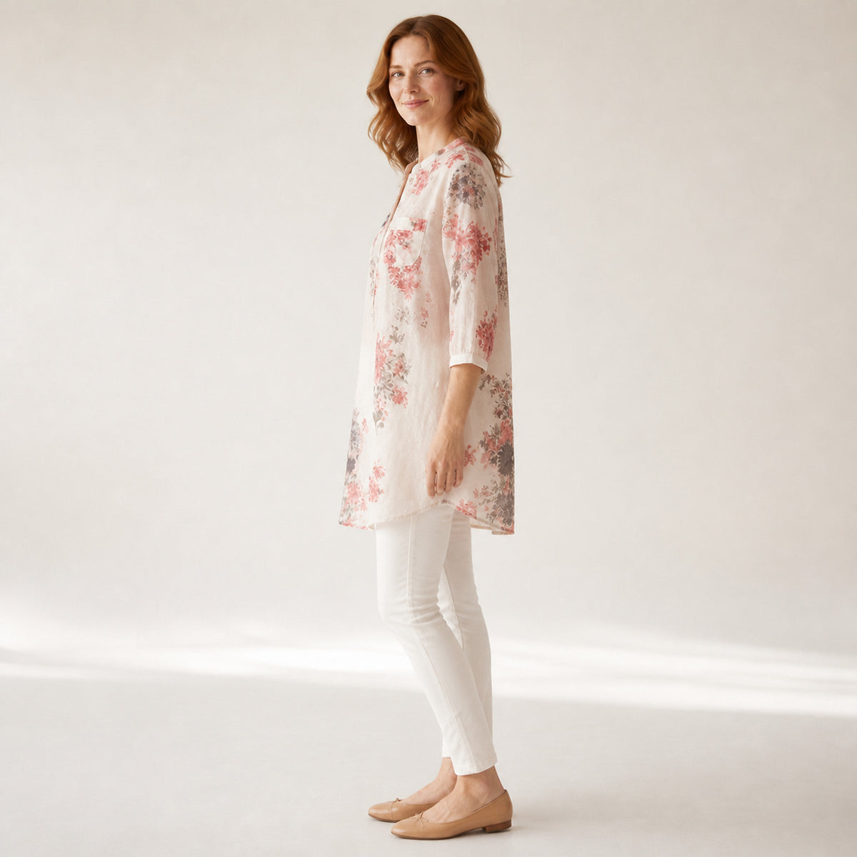 Marnie Floral Linen Shirt in red floral, side view showing the long-line length