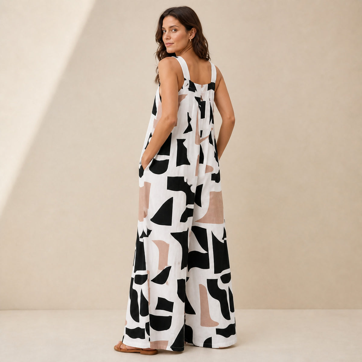 Wilder Print Jumpsuit in white print, back view