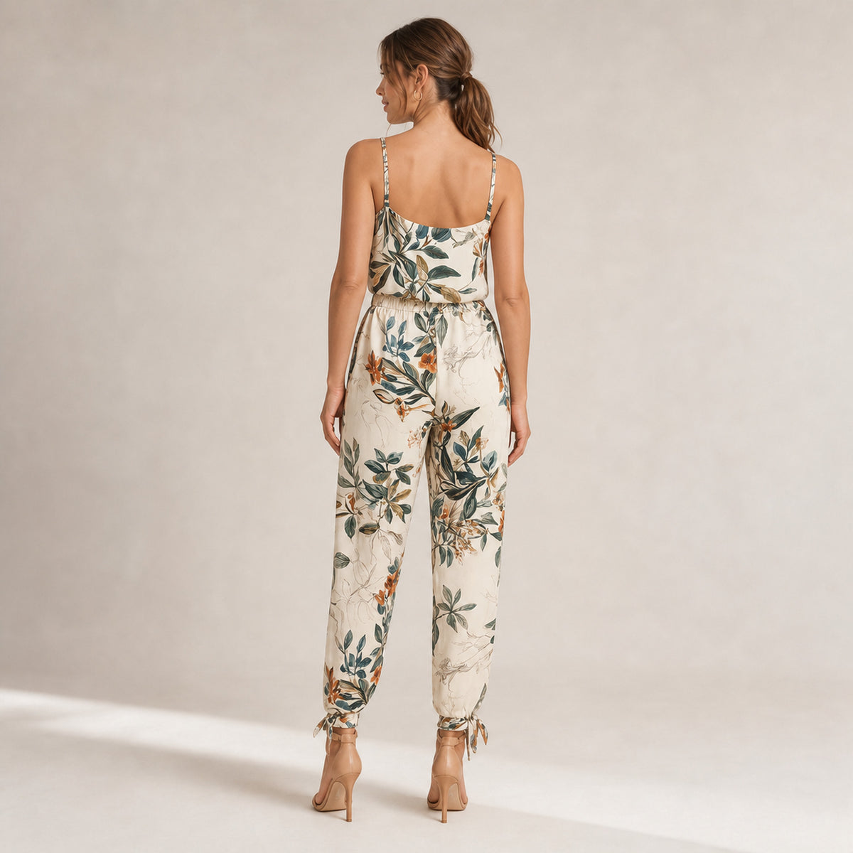 Romy Wrap Jumpsuit in white print, back view