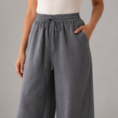 Close-up of the drawstring waist and pocket on the Billie trousers