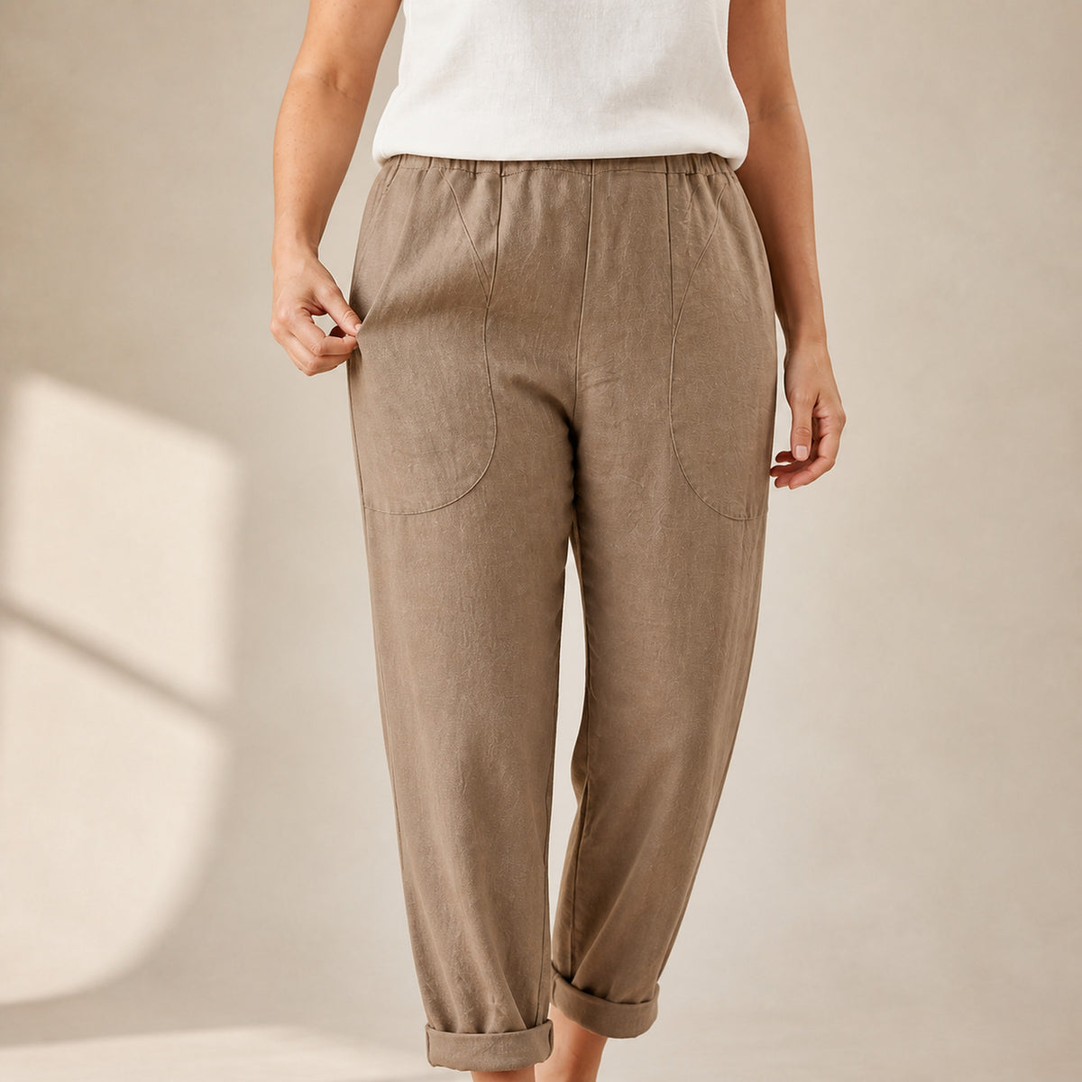 Close-up of the pocket and linen fabric on the Sadie trousers
