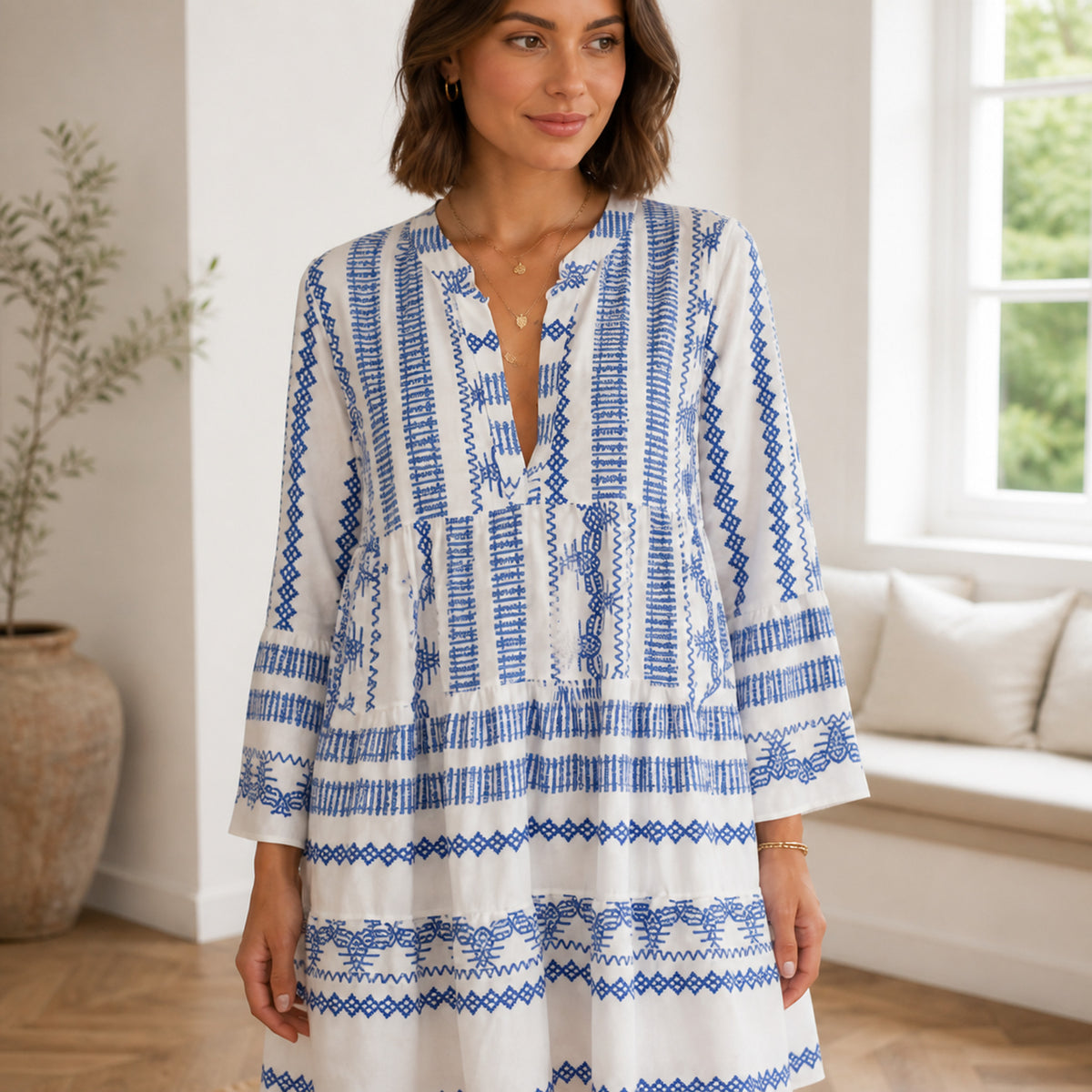 Close-up of the geometric print and yoke on the Saskia mini dress