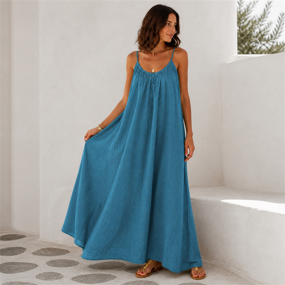 Close-up of the halter neckline on the Ophelia Linen Maxi in blue