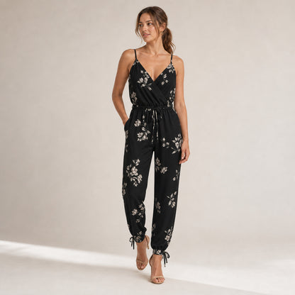 Romy Wrap Jumpsuit in black print, front view