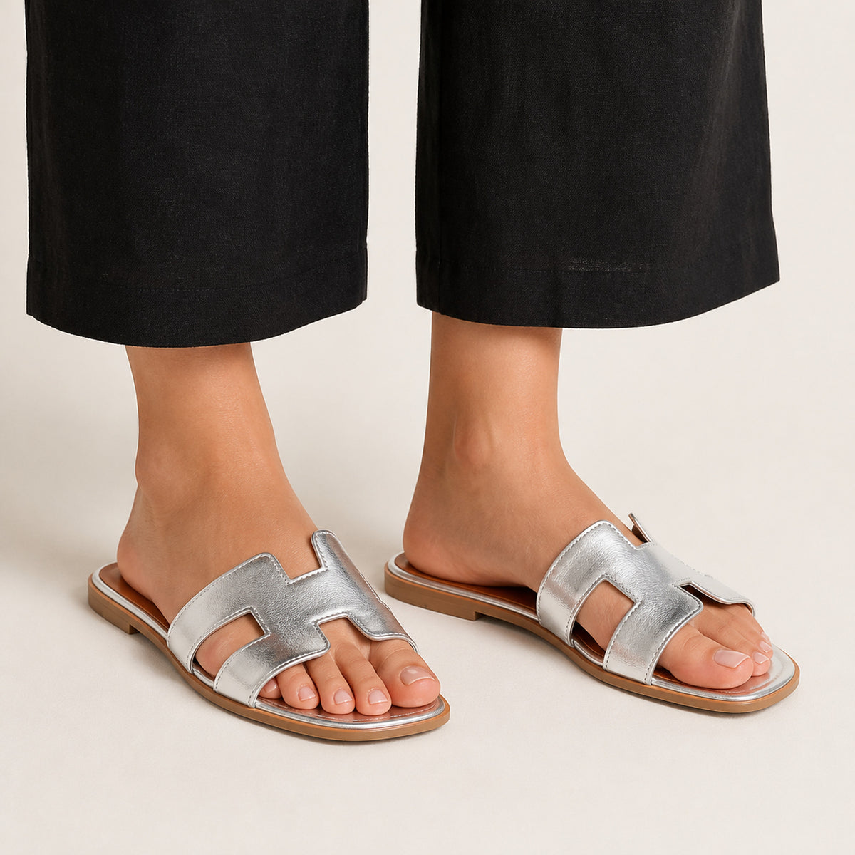 Nia Flat Slides in silver, front view