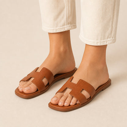Nia Flat Slides in brown, front view