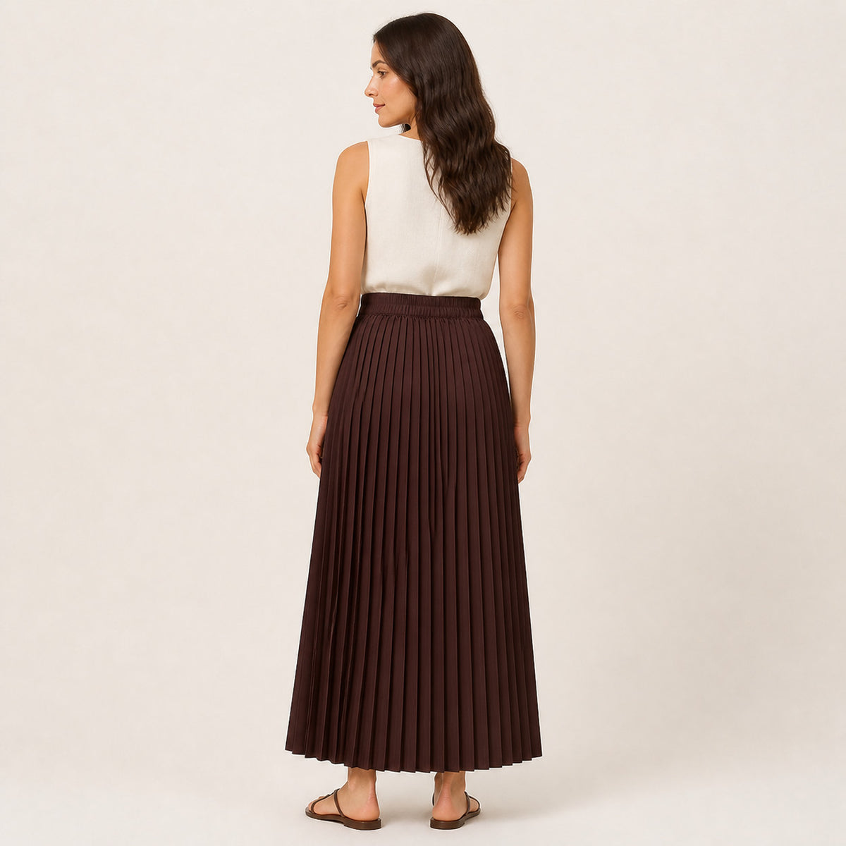Maren Pleated Skirt, showing the pleats falling to mid-calf