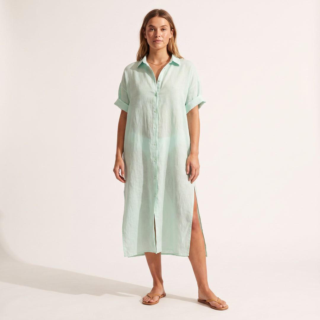 Maeve Oversized Linen Dress in mint green, front view with the side split visible
