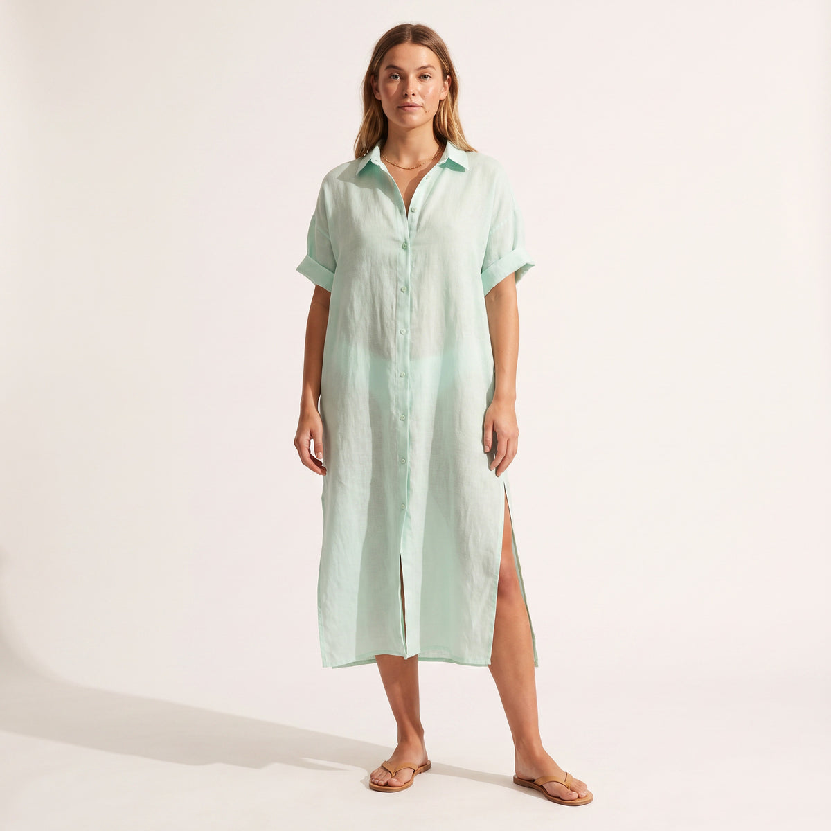 Maeve Oversized Linen Dress in mint green, front view with the side split visible