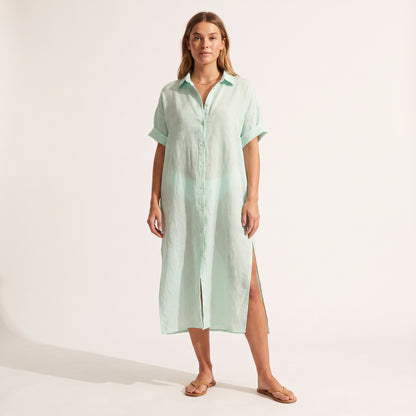 Maeve Oversized Linen Dress in mint green, front view with the side split visible
